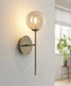 Lucande Wynona -seinävalaisin, 1-lamp., Messinki